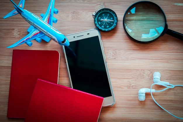 Foto primer plano de libros y teléfono inteligente en la mesa