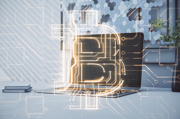 Primer plano del lugar de trabajo contemporáneo con computadora portátil y holograma de circuito de bitcoin brillante creativo sobre fondo borroso Blockchain de criptomonedas y concepto de finanzas Doble exposición