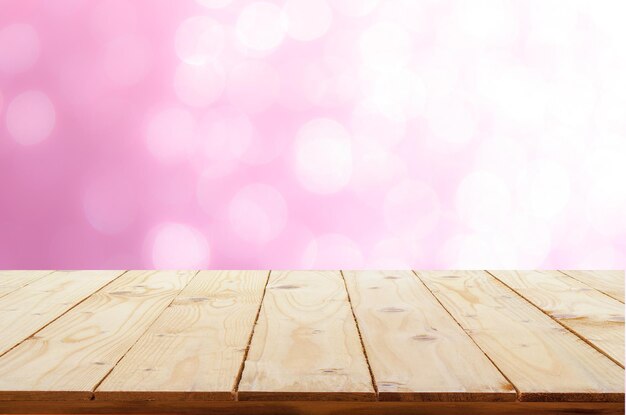 Foto primer plano de madera contra un fondo rosado