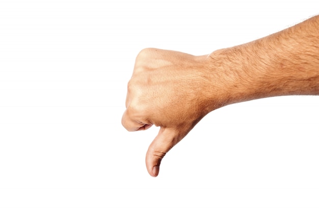 Primer plano de la mano masculina en blanco muestra gesto de la mano, dedo hacia abajo. Aislar.