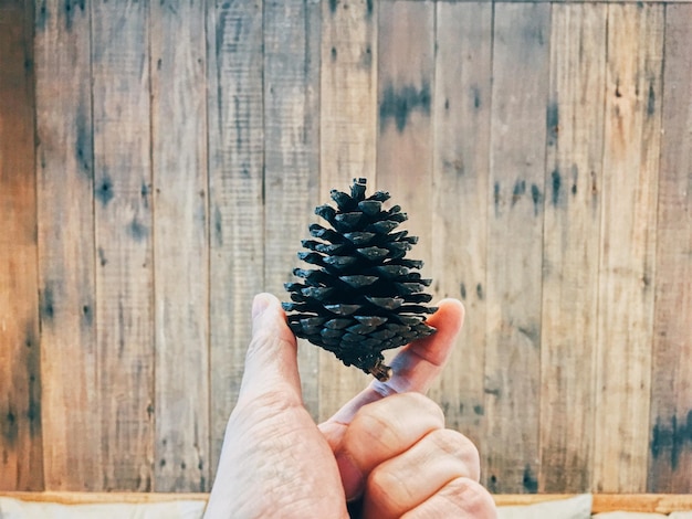 Foto primer plano de la mano sosteniendo el helado