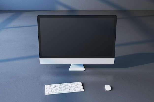 Primer plano de un monitor de computadora simulado vacío sobre un fondo gris Concepto de escritorio de diseñador minimalista Renderización 3D