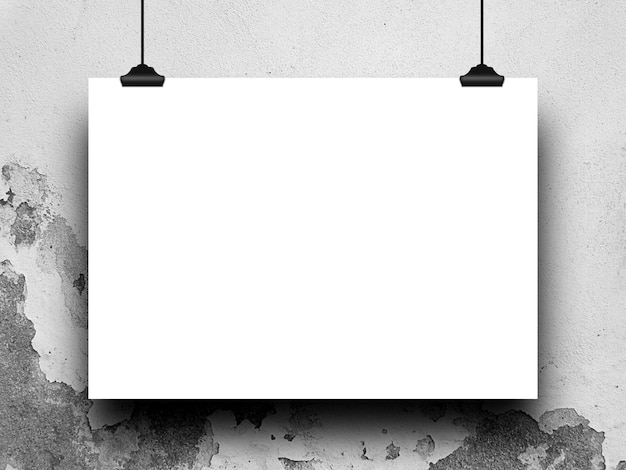Primer plano de un papel en blanco colgado en la pared