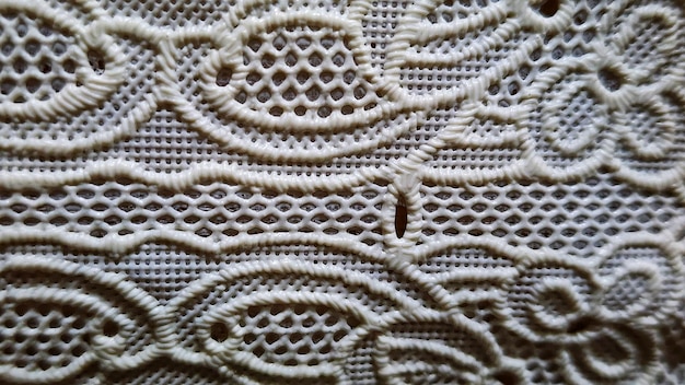primer plano de un patrón de encaje blanco