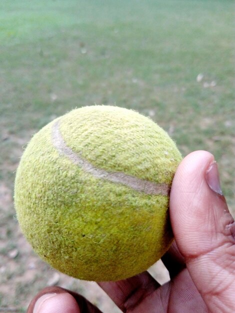 Foto primer plano de la pelota en la mano