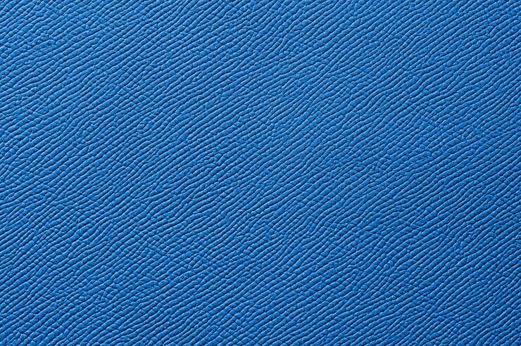 Primer plano de una perfecta textura de cuero azul para el fondo