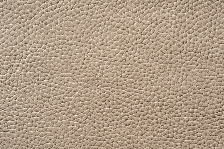 Primer plano de una perfecta textura de cuero beige para el fondo