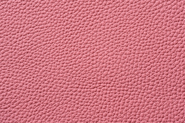 Primer plano de una perfecta textura de cuero rosa para el fondo