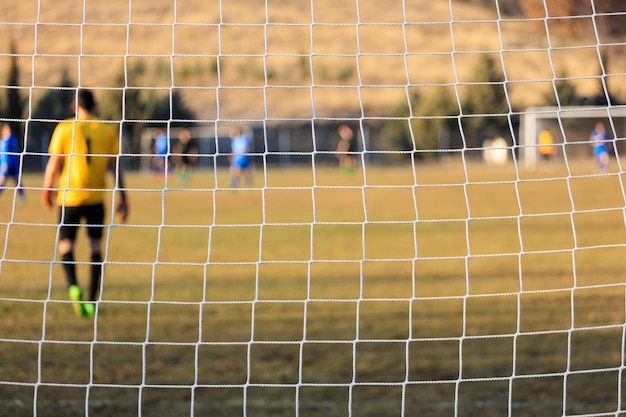 Primer plano de red de portería de fútbol