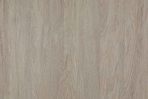 Primer plano de la superficie beige-gris de laminado de madera