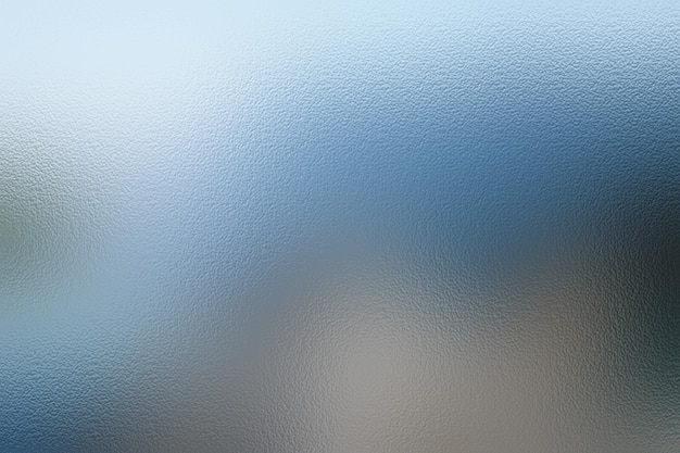 Un primer plano de una superficie brillante azul con un fondo azul