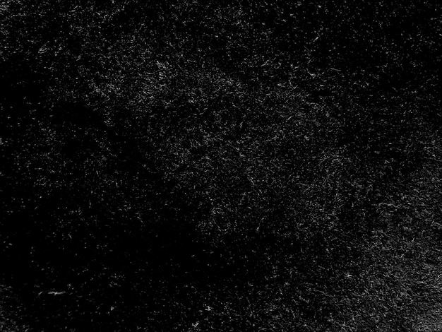 Primer plano de una superficie negra con textura