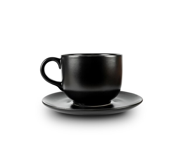 Foto primer plano de una taza de café contra un fondo negro