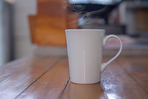 Foto primer plano de una taza de café en la mesa