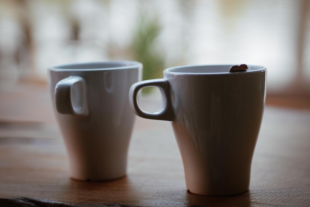 Foto primer plano de una taza de café en la mesa