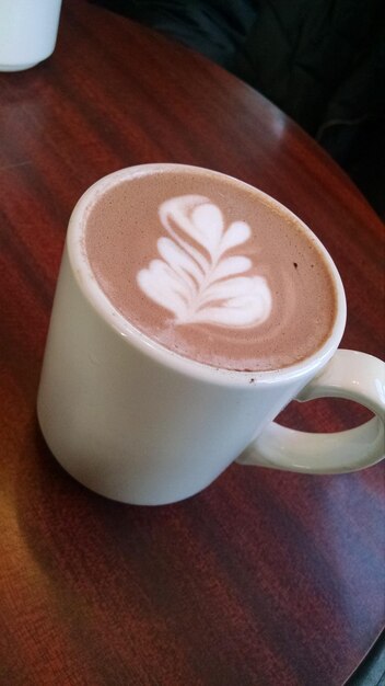 Foto primer plano de una taza de café en la mesa