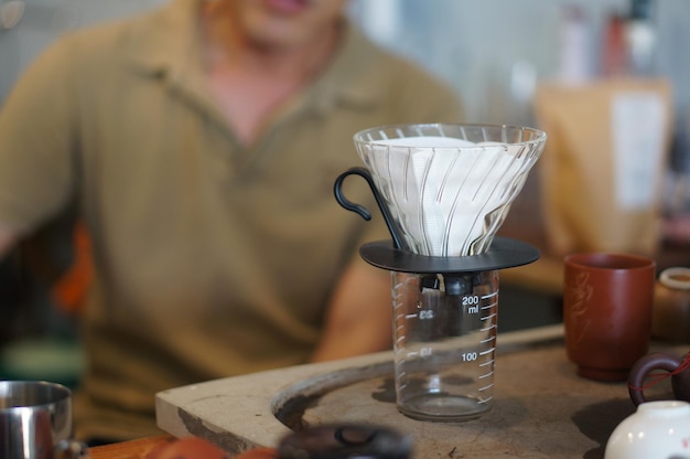 Foto primer plano de la taza de café en la mesa