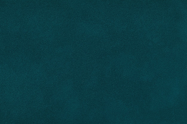 Primer plano de tela de gamuza mate verde oscuro Fondo de textura de terciopelo.