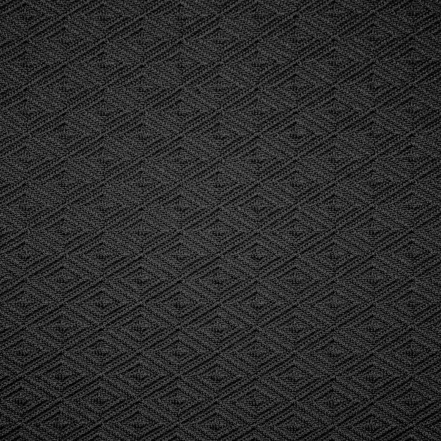 Primer plano de una textura de diamante tejido negro
