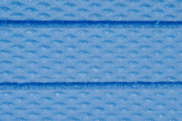Un primer plano de la textura de la placa de espuma de xps azul