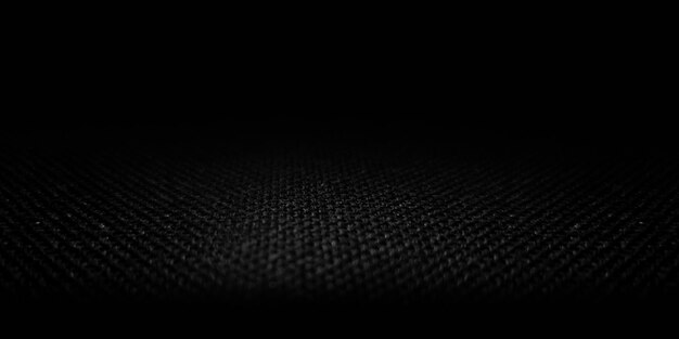 Primer plano y textura de tela oscura Fondo negro con textura áspera