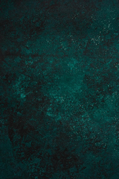 Foto primer plano vertical de un fondo verde oscuro para fondos de pantalla