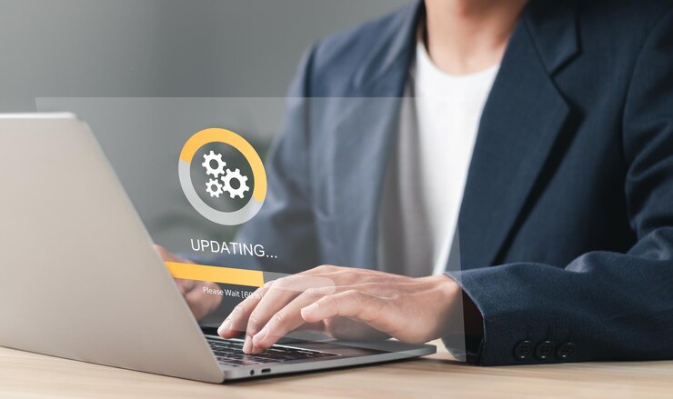 Foto proceso de actualización de software o actualización del sistema operativo para mantener el dispositivo actualizado con funcionalidad añadida en la nueva versión y mejorar la seguridad