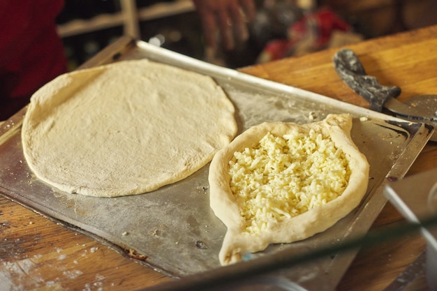 Proceso de cocción, culinario, receta, panadería casera, khachapuri