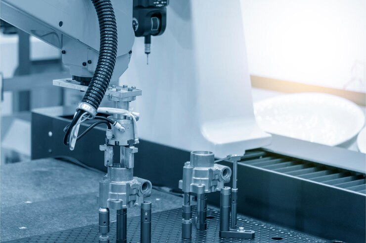 El proceso de manipulación de materiales por sistema robótico en el proceso de mecanizado de CMM El control del proceso de fabricación de piezas de automóviles por sistema informático