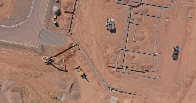 Proceso de preparación de la vista aérea de la casa de nueva construcción obras de construcción del nuevo distrito residencial