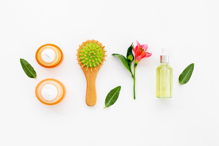 Foto produtos cosméticos para os cabelos com óleo natural e pente