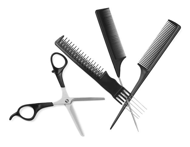 Professionelle Friseurwerkzeuge isoliert auf Weiß