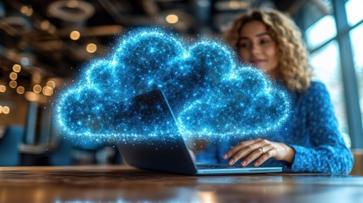 Profissional de negócios usando software baseado na nuvem em um laptop enquanto colabora com uma equipe remota, simbolizando a flexibilidade e eficiência das ferramentas digitais