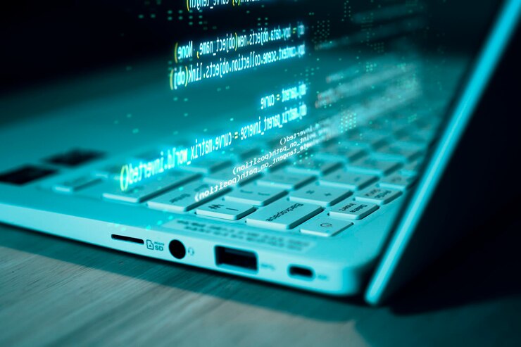 Foto la programación de computadoras en el código fuente de la computadora portátil se muestra en el teclado de la computadora portátil