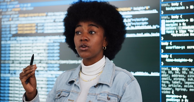 Programming lecture student and woman in college for learning education and teaching ai course African person class and study coding with data for software development in presentation on screen