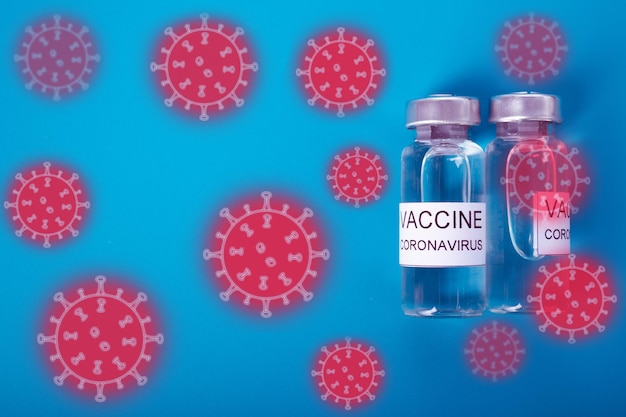 Proteção de ícone de bactéria Covid contra coronavírus com ampola de vacinação com a vacina é cercada por um vírus