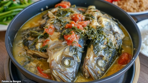 Foto pruebe la auténtica delicia del paksiw na bangus, un plato filipino local capturado en un delicioso p