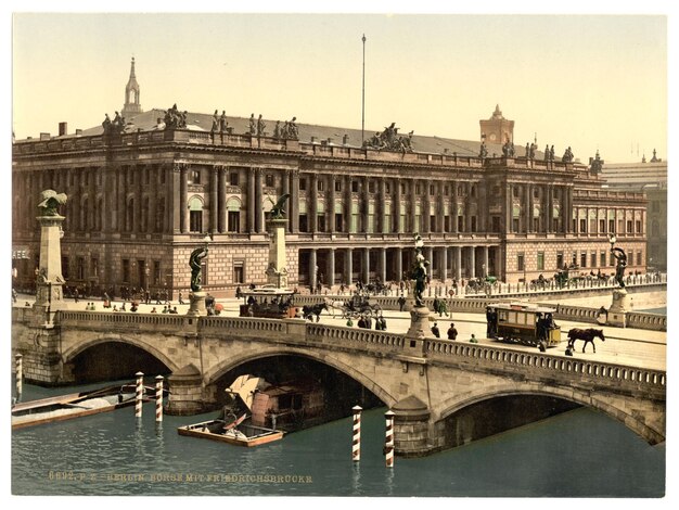 Foto un puente con un barco y un edificio en el fondo