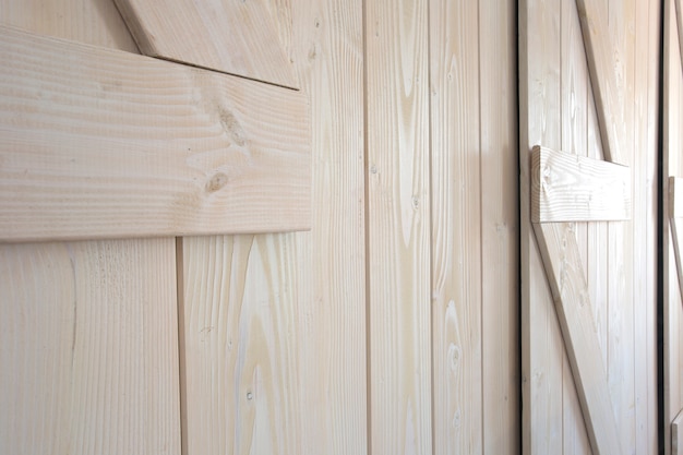 Puertas de granero de madera clara textura de fondo moderno interior close-up