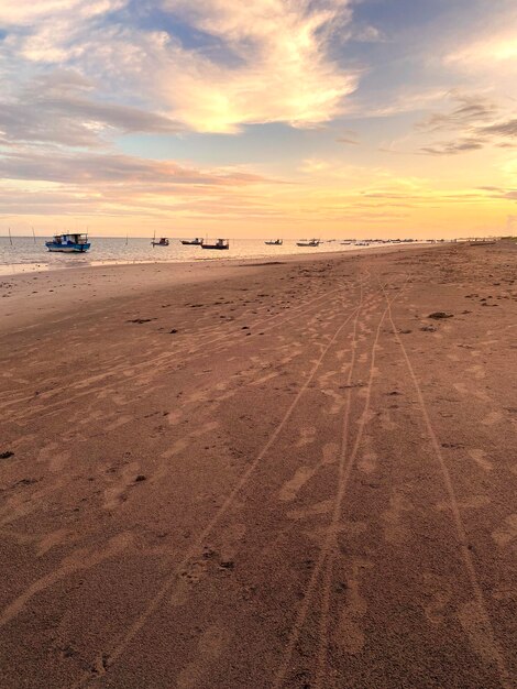 Foto puesta de sol en la playa