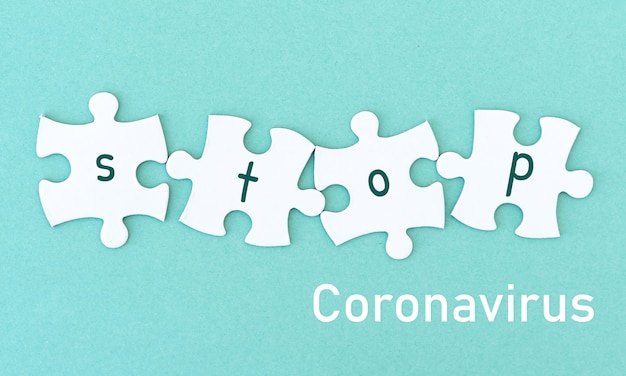 Puzzleteile Wort stoppen Coronavirus