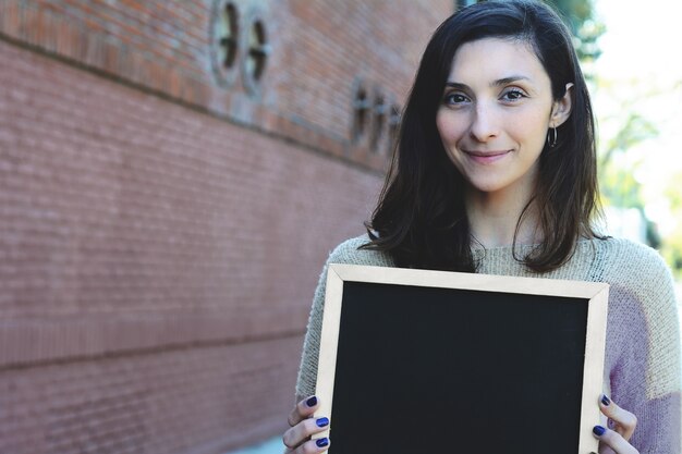 Quadro de exploração de mulher.