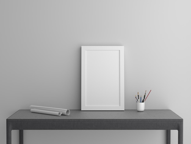 Quadro em branco na mesa contra a parede