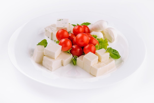 Queijo mussarela com tomate cereja e queijo de cabra