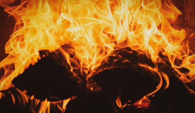 Queima de madeira aconchegante fogo lareira de natal textura de fogo fundo de chama