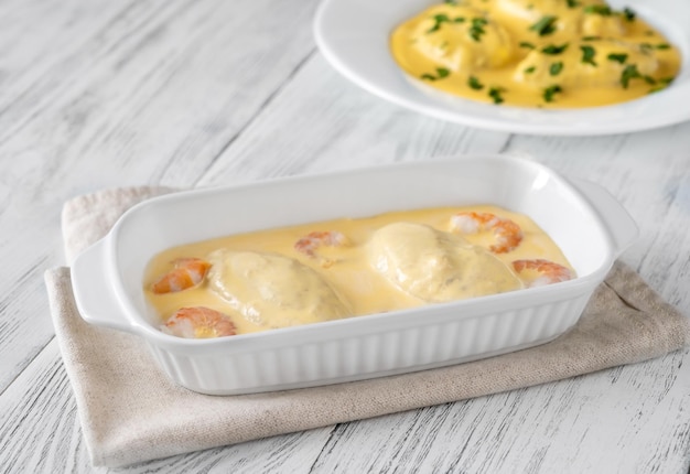 Quenelle Fischrahmmischung mit Sauce Hollandaise