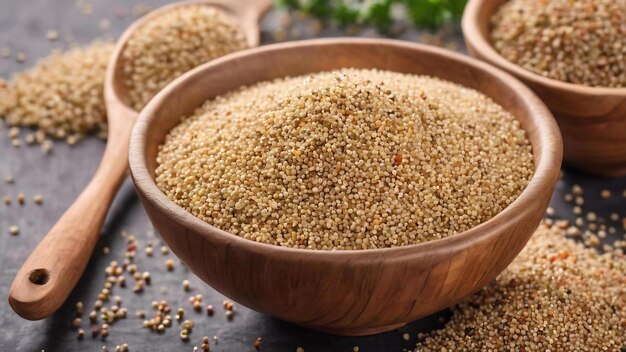 Quinoa-Samen in einer Schüssel und einem Löffel auf farbigem Hintergrund gesundes Kinwa in einer kleinen Schüssel gesundes Superfood