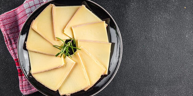 Raclette-Käse lecker zu essen Kochen Vorspeise Mahlzeit Nahrung Snack auf dem Tisch Kopieren Raum Nahrung