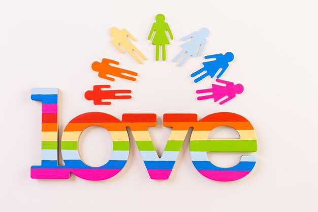Rainbow Gay Pride recortes masculinos y femeninos sobre un fondo blanco.