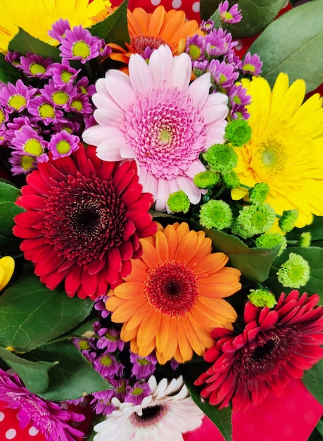 Foto un ramo de gerbera fondo de flores de colores